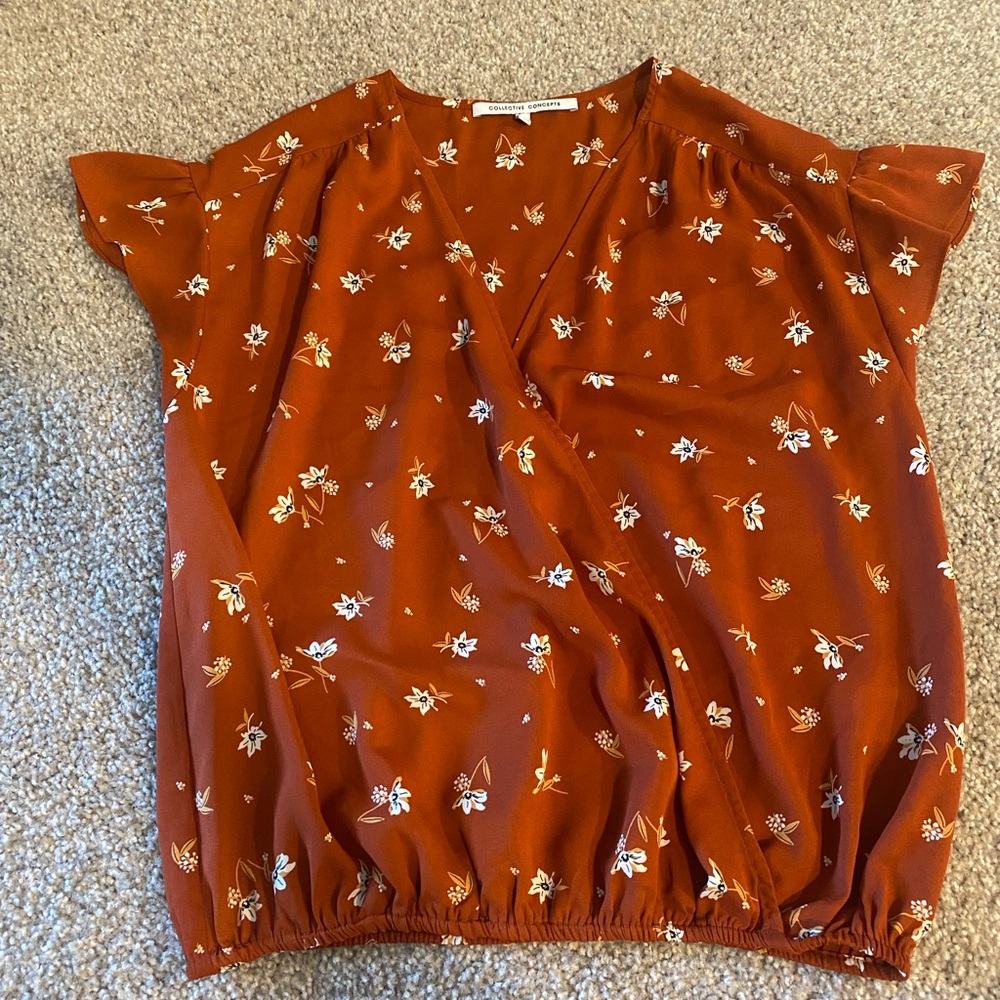Orange wrap top with small floral